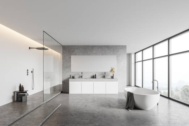 istock White bathroom interior with sink, shower and tub 1305634989