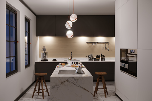 Modern designed cozy kitchen interior in the evening. ( 3d render )