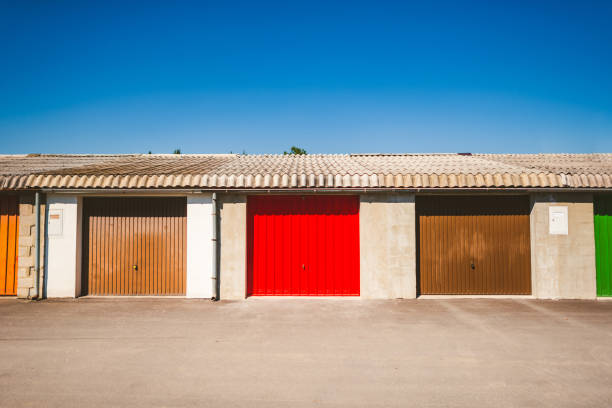 Row of colorful rusty garages or outdoor storage sheds