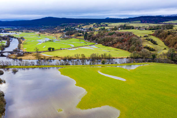 Aerial view of flooded fields after heavy rain The view from a drone of agricultural fields flooded by heavy rain the location is Dumfries and Galloway south west Scotland Galloway Hills stock pictures, royalty-free photos & images