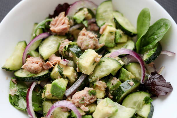 istock Vegetable salad with tuna and avocado 1305640788