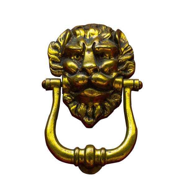 istock Original brass knocker in the shape of a lion's head, knocker isolated on white background 1305641274