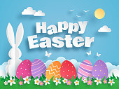 istock Happy Easter paper art with Easter eggs and rabbit, greeting card. Paper cut style. Vector illustration 1305645248