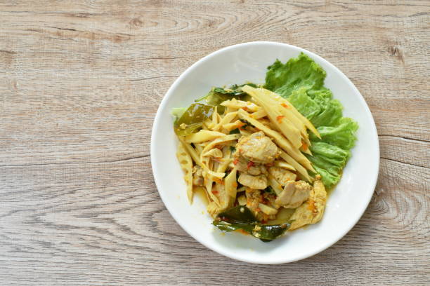 istock spicy stir fried bamboo shoot and chicken with curry 1305646548