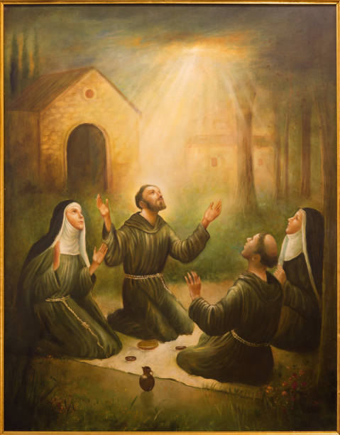 Cordoba - The St. Francis of Assisi and St. Clara at prayer Cordoba - The St. Francis of Assisi and St. Clara at prayer in front of Porziuncola in church Convento de Capuchinos (Iglesia Santo Angel) by unknown artist nun catholicism sister praying stock pictures, royalty-free photos & images