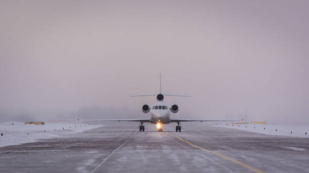 istock White private airplane taxiing 1305649368