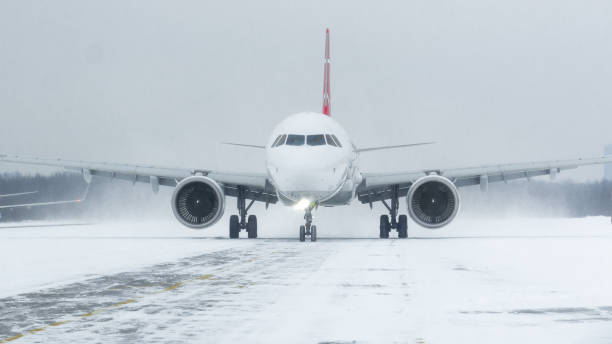 istock White with red airplane taxiing 1305649384