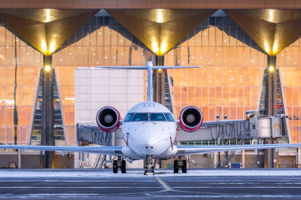 istock White with red airplane on the stand 1305649536