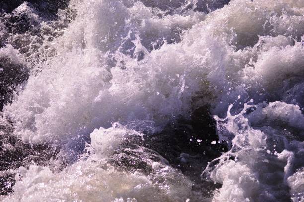 istock Seething mountain river in winter 1305651866