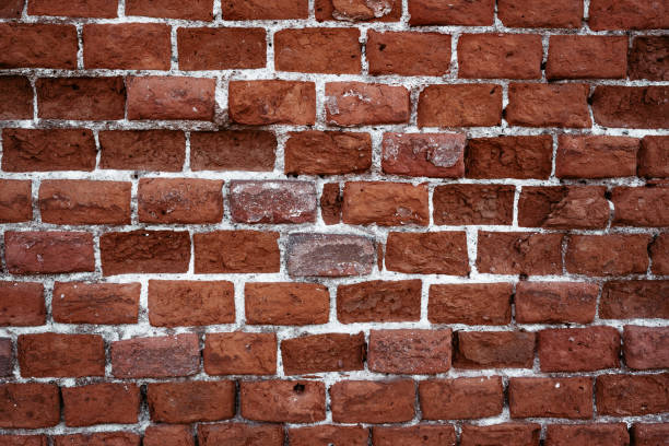 istock Closeup of old vintage red brick wall 1305652085