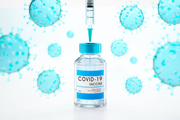 istock Covid-19 vaccine flask with syringe 1305653100