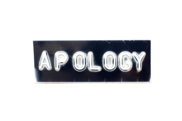 embossed letter in word apology on black banner with white background - closed sadness reconciliation sign imagens e fotografias de stock