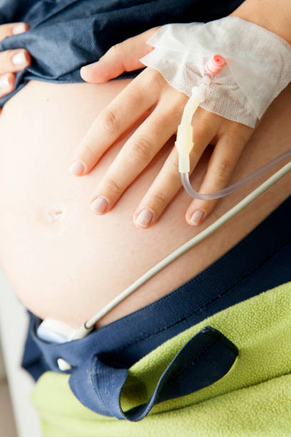 istock Pregnant Woman check up 1305659236