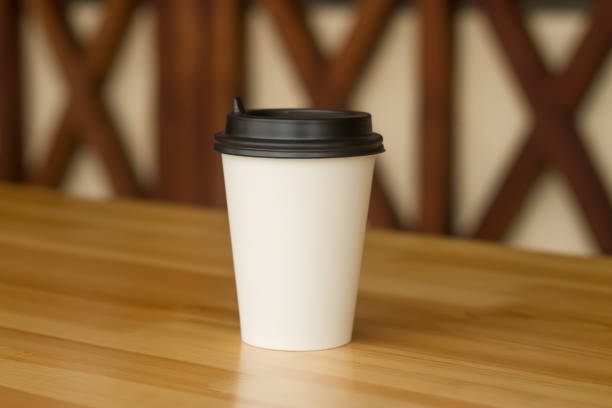 Paper cup for coffee, tea with an empty space for logo.