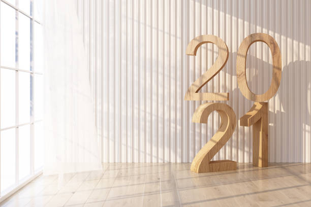 istock Wooden floor Light shines through the window and shadows fall on it. with white wall and sheer with 2021 text on wall 3d rendering 1305666278