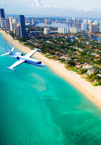 istock Airplane flying to Miami. 1305668324