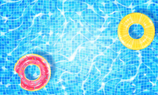 istock Swimming pool with two floating rings, caustic ripple and sunlight glare effect. Aquatic surface with waves background. Realistic vector illustration of underwater bottom texture, top view 1305669510