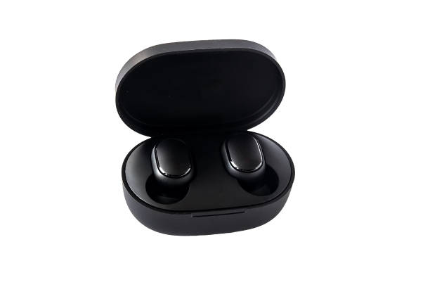 istock Wireless headphones on a white background. Close-up. Bluetooth headset in charging case. 1305670082