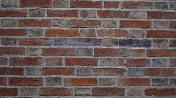 vieille texture rouge de mur de brique - brick wall brick surrounding wall wall photos et images de collection