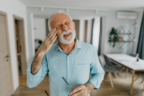 istock Senior Man Suffering From Neck Pain 1305675552