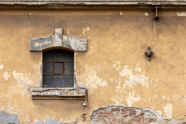 istock Window of an old abandoned factory 1305677941