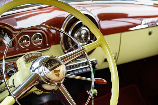 Miami, Florida USA - March 12, 2017: Close up view of the interior of a beautifully restored vintage 1950 Pontiac automobile at a public car show along Palmetto Bay.