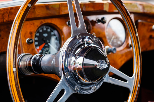 Miami, Florida USA - March 12, 2017: Close up view of the interior of a beautifully restored vintage 1951 British Jaguar XK120 convertible automobile at a public car show along Palmetto Bay.