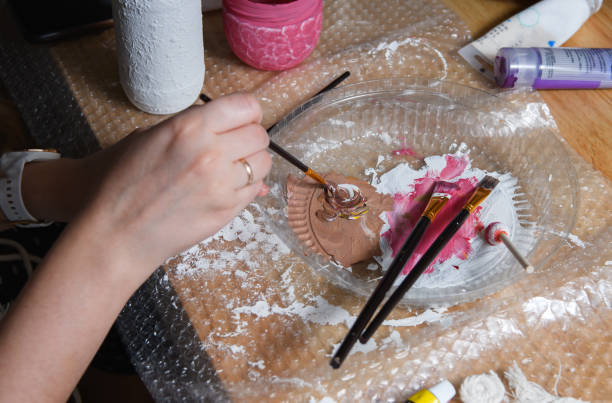 istock Mixing acrylic paints with a paint brush 1305682631