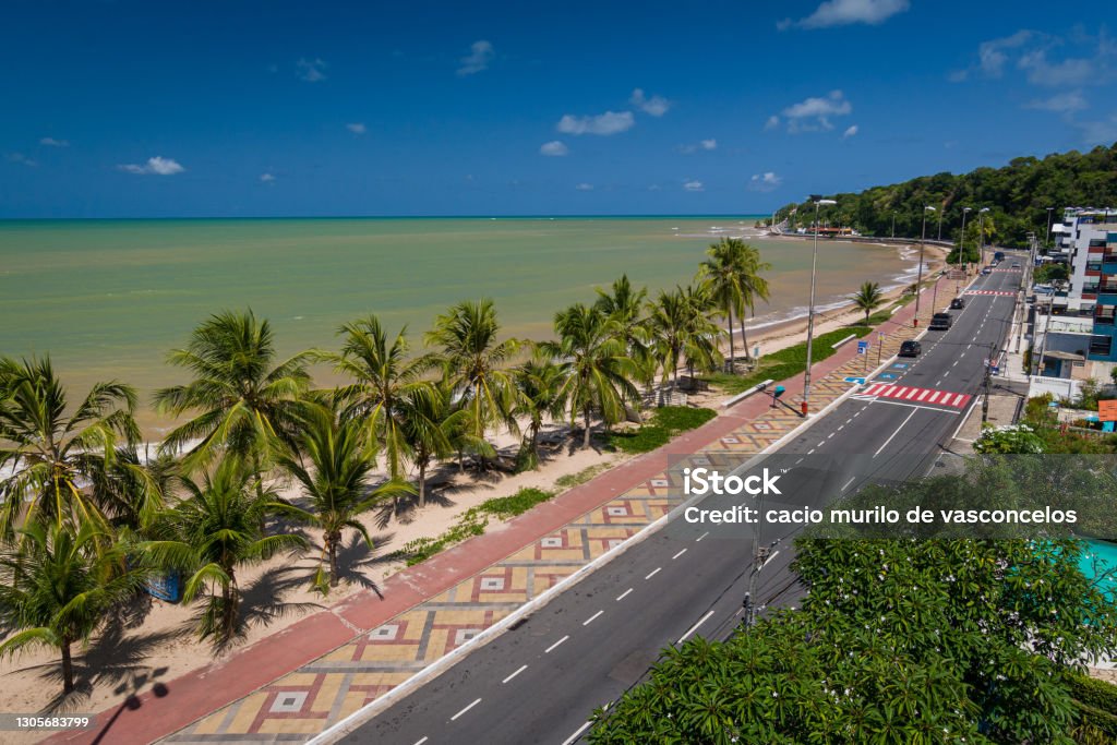 Cabo Branco beach with white sands and coconut grove in João Pessoa, Paraíba State, Brazil on March 10, 2009. The extreme eastern geographic point of the Americas. João Pessoa Stock Photo