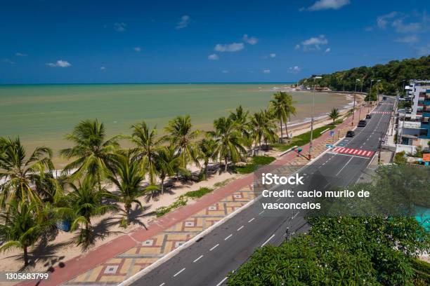 Cabo Branco Beach With White Sands And Coconut Grove In João Pessoa Paraíba State Brazil On March 10 2009 The Extreme Eastern Geographic Point Of The Americas Stock Photo - Download Image Now