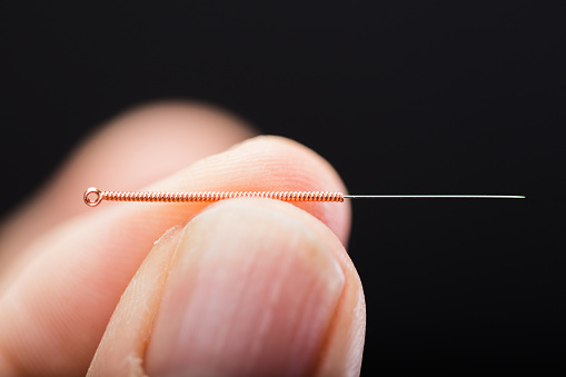 Acupuncture needle close up. XXXL size image.