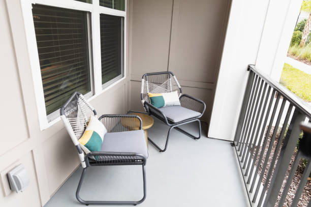 istock Small apartment balcony with two chairs 1305686169