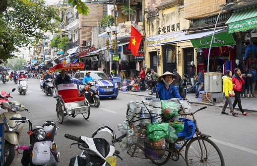 Hanoi, Vietnam, November 24, 2014: View of the traffic on a street in downtown of the Vietnamese capital.