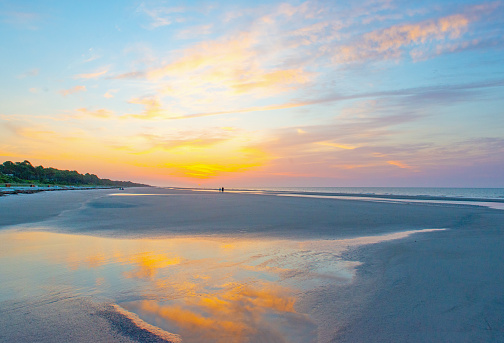 Sunrise reflected in a tide pool-Hilton Head, South Carolina