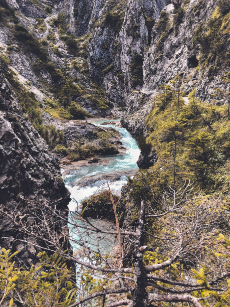 istock small waterfall in a waterstream in a gorge 1305693209