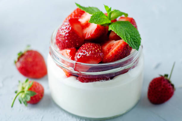 istock Greek yogurt strawberry parfaits with fresh berries 1305694221