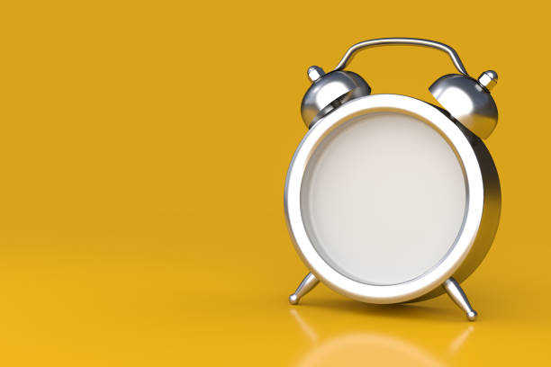 istock Customizable Metallic Classic Alarm Clock on Yellow Background 3D Illustration 1305695110