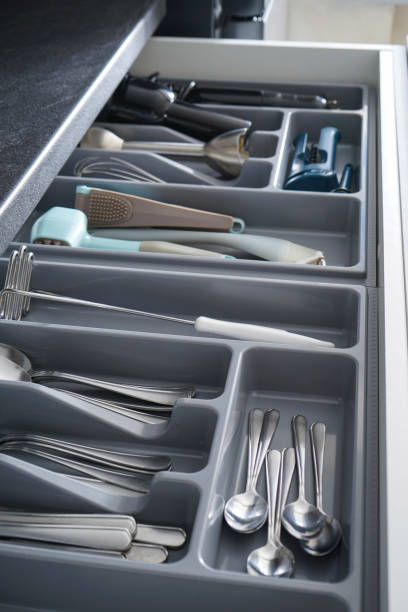 Set of cutlery in kitchen drawer stock photo