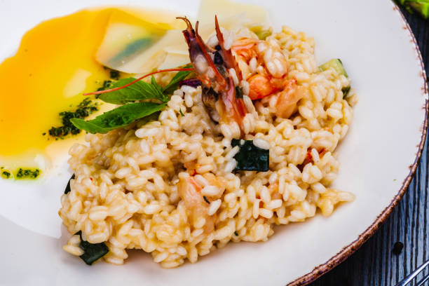 istock Risotto with seafood on white plate. 1305699572