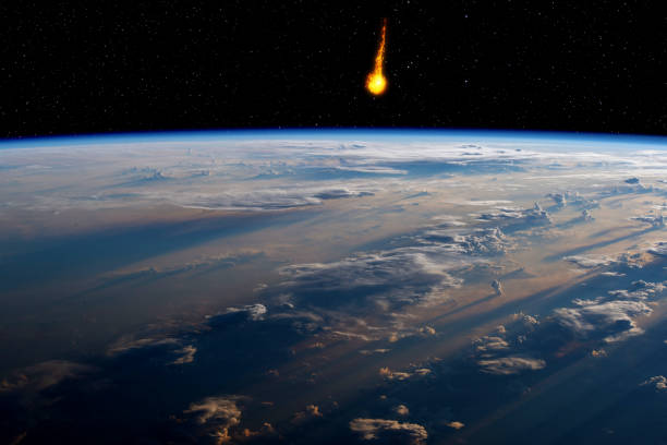 istock Asteroid approaching planet Earth, total disaster and life extinction, elements of this image furnished by NASA (https://www.nasa.gov/image-feature/sunrise-shadows-over-the-philippine-sea) 1305703565