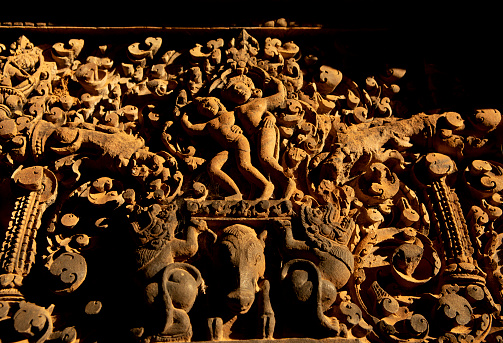 Ancient temple carvings at the Banteay Srei site in Cambodia.