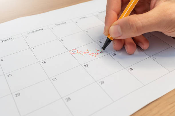 istock Tax day marked on calendar 1305707879