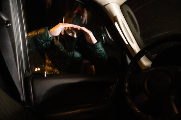 istock Thief is going to steal the car 1305714178