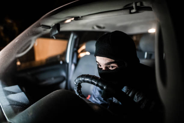 istock Thief escaping with stolen car 1305714209