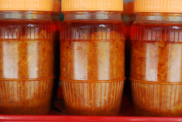 istock Spicy chilli oil for sale 1305716755