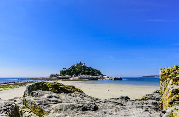 istock Chapel Rock and St Michaels Bay in background 1305720144