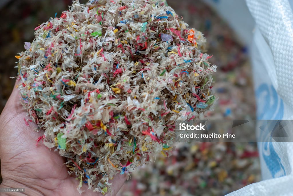 Garbage is hurting the planet Photo showing the various stages of solid waste management, including processing of biodegradable trash Microplastic Stock Photo