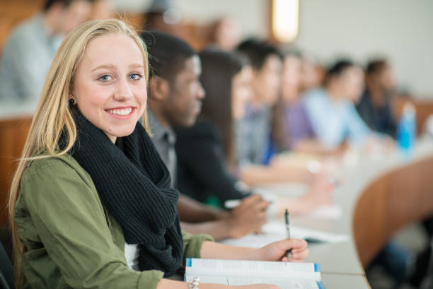 istock Smiling University Student Stock Photo 1305725454