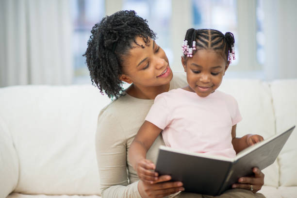 istock Reading With Mum Stock Photo 1305733668