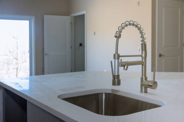 istock Modern domestic cabinets with new sink in kitchen 1305734727